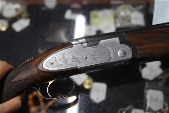 A 12-bore Beretta Giorlanelli over and under double barrel shotgun,
